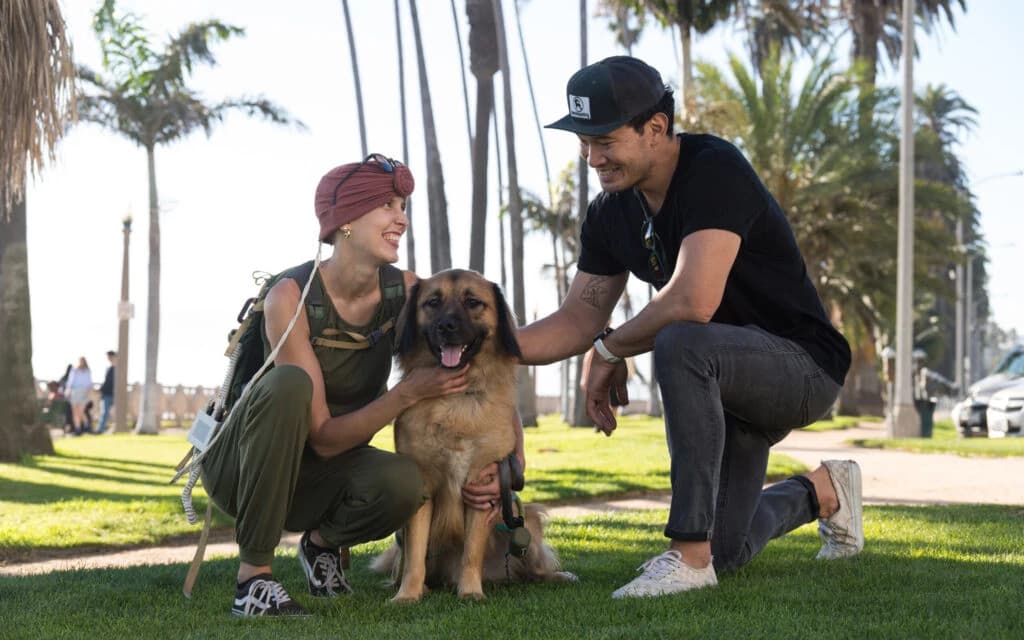 Portrait of Janice, a diverse professional woman with curly hair, smiling confidently against a neutral background